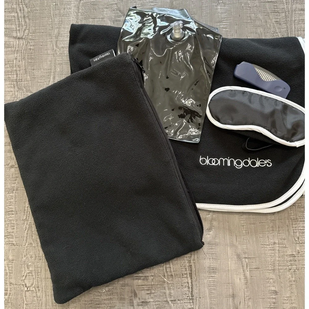 Bloomingdale's black travel or comfort kit Bag, blanket, sleep mask pillow comb